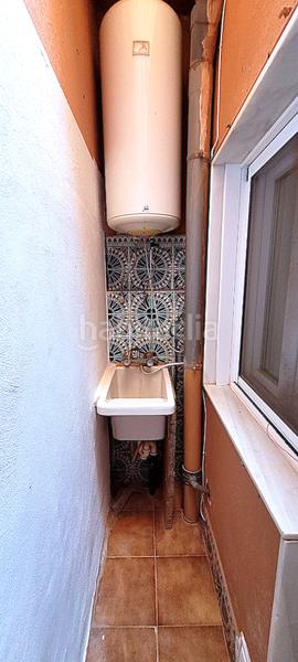 Foto ec553cbe-691f-4b95-92af-da81bcdaec7e. Casa a schiera con camino riscaldamento in Roquetas pueblo Roquetas de Mar