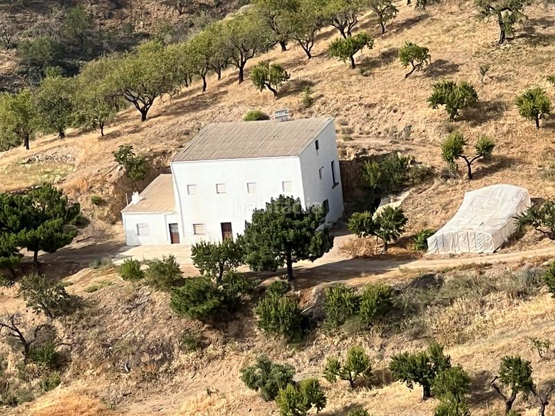 Foto 197e0b61-56ce-4281-99d1-3b3b52b7f4be. Masía en calle sol 1 cortijo con dos viviendas y finca en produccion en Torvizcón