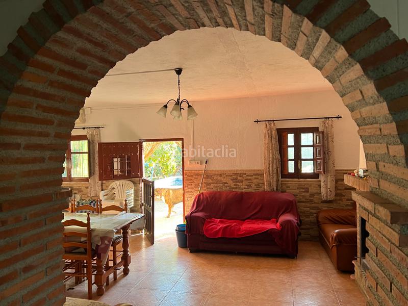 Foto 0fdcbc68-81b9-474f-a06f-67df24eea551. Masia amb xemeneia calefacció aparcament piscina a Órgiva