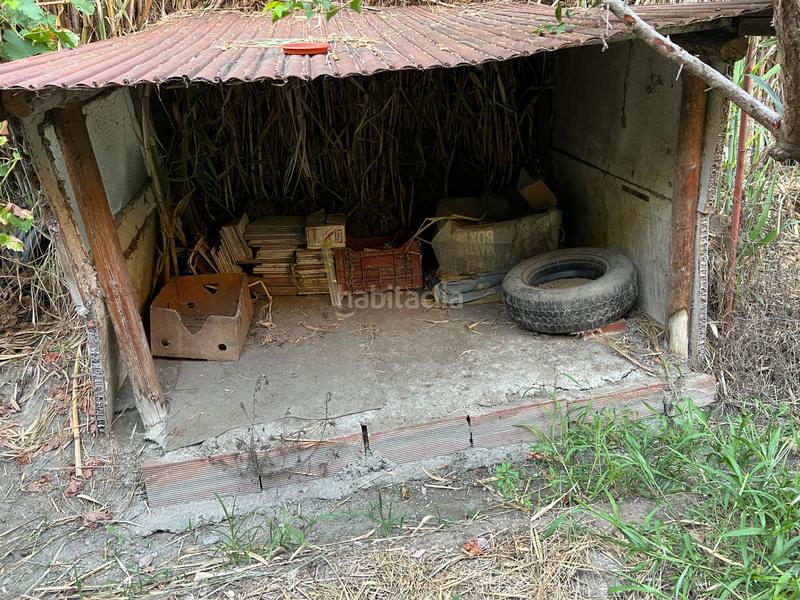 Foto 7c50cef2-2550-49e0-afd3-023e093f7fc3. Masia amb xemeneia calefacció aparcament piscina a Órgiva