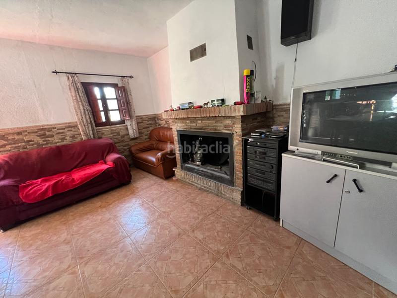 Foto b65e5487-c985-4f37-84c6-c4f920be4c38. Masia amb xemeneia calefacció aparcament piscina a Órgiva