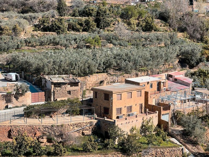 Foto c8c54b16-3e96-4346-891b-5bfb4db9d411. Finca rústica finca con casa para restaurar en Lanjarón