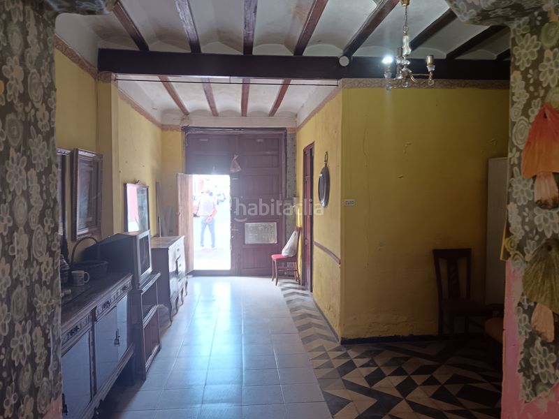 Foto a605aecd-5a8d-47f2-86c8-80a0dcb337ab. Casa adossada amb xemeneia a La Bosca Burriana