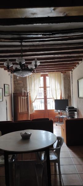 Foto 0e83b10c-1746-44e5-8f31-7eb82fc9ede7. Casa adossada amb xemeneia calefacció a Salzadella (la)