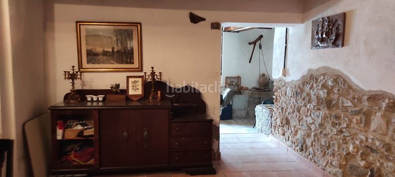 Foto 8521e5a8-1a9e-4d8f-a1c4-a31f5642b99c. Casa adossada amb xemeneia calefacció a Salzadella (la)
