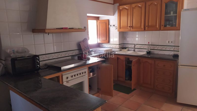 Foto a3637a1e-2ba1-4fee-90ca-9e5418155bf6. Casa adossada amb xemeneia calefacció a Salzadella (la)