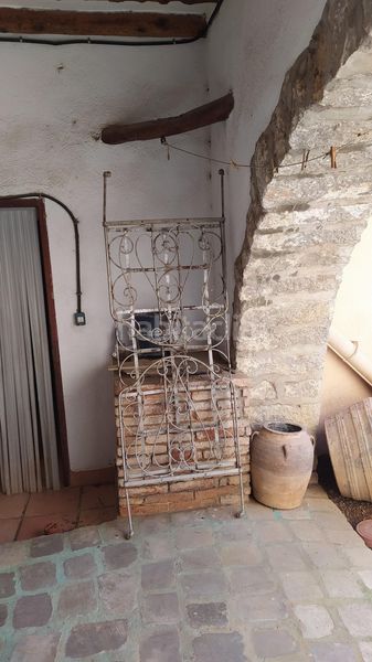 Foto bf3bbbd0-0bbf-4065-9aa9-2b46ff8c2cdc. Casa adossada amb xemeneia calefacció a Salzadella (la)