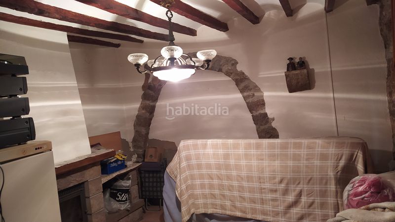Foto c42c2f68-c573-4d04-97e8-8c7818b00da2. Casa adossada amb xemeneia calefacció a Salzadella (la)