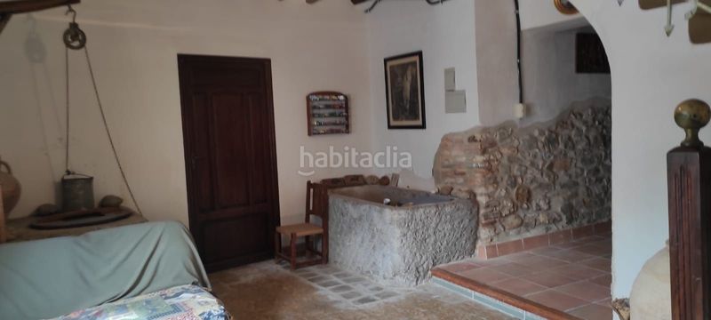 Foto d325daf6-467f-4c5a-952e-31a1db7c9771. Casa adossada amb xemeneia calefacció a Salzadella (la)