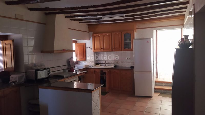 Foto eb3be6f9-a5a9-4904-adda-8d0e6080d92c. Casa adossada amb xemeneia calefacció a Salzadella (la)