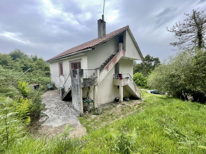 Foto 7c0f966d-6623-4c48-a756-ec76c01b71d4. Casa amb aparcament a Grove (O)