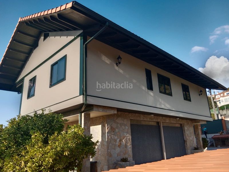 Foto df106bae-f7b1-417d-82d3-fbd5f0227bf9. Xalet amb aparcament a Redondela