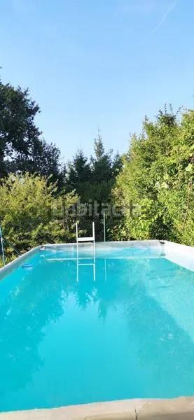 Foto 2f394881-8297-4a7b-bb72-e15d159a4f1a. Chalet avec cheminée chauffage parking piscine dans Rosal (O)