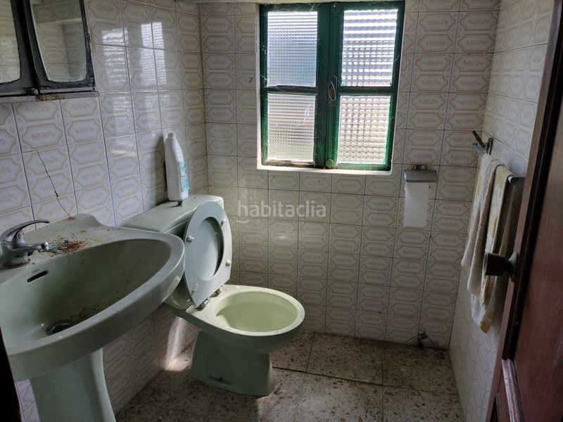 Foto 4d101f47-5257-46f1-b2e8-4c69193a0ec7. Casa adossada a Boqueixón