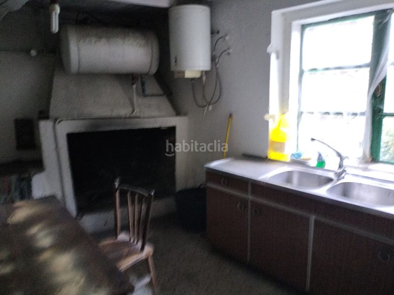 Foto 96a78efc-786d-4b90-ae2f-5013f7b80ca0. Casa adossada a Boqueixón