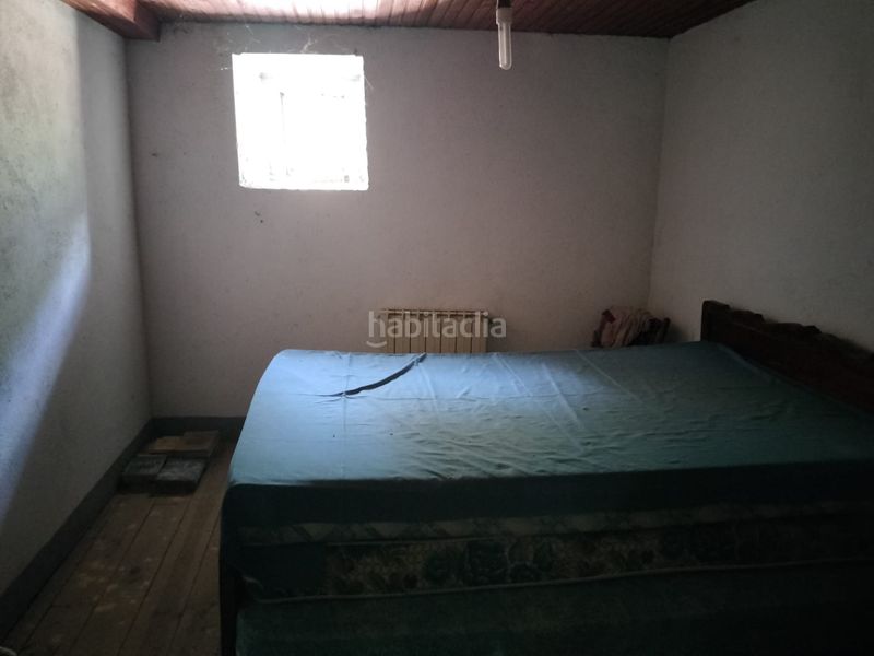 Foto a9a86f85-f56b-4af9-ae5c-e4ca233b2c25. Casa adossada a Boqueixón