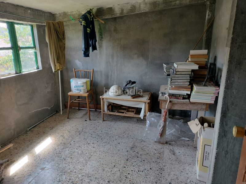 Foto b0d279dc-ad51-45ae-b4b6-8f1d4692ff7c. Casa adossada a Boqueixón