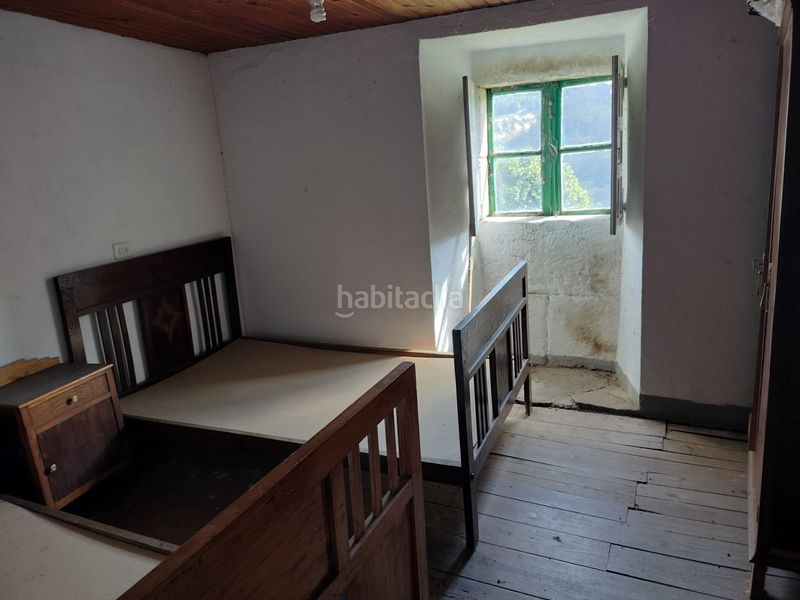 Foto e579f99f-ea3f-4aba-a740-ada6af9b195c. Casa adossada a Boqueixón