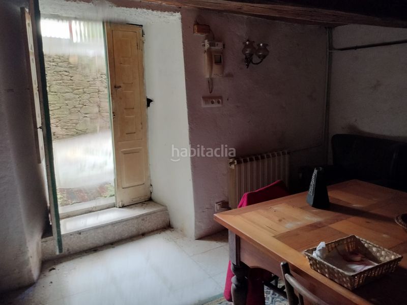 Foto ebac48d6-11af-4cc4-bc2d-005a6c920452. Casa adossada a Boqueixón