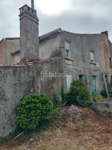 Foto fb833e2c-b2a2-4d03-8bbd-f0647e5b0c52. Casa pareada  en venta en Cambados