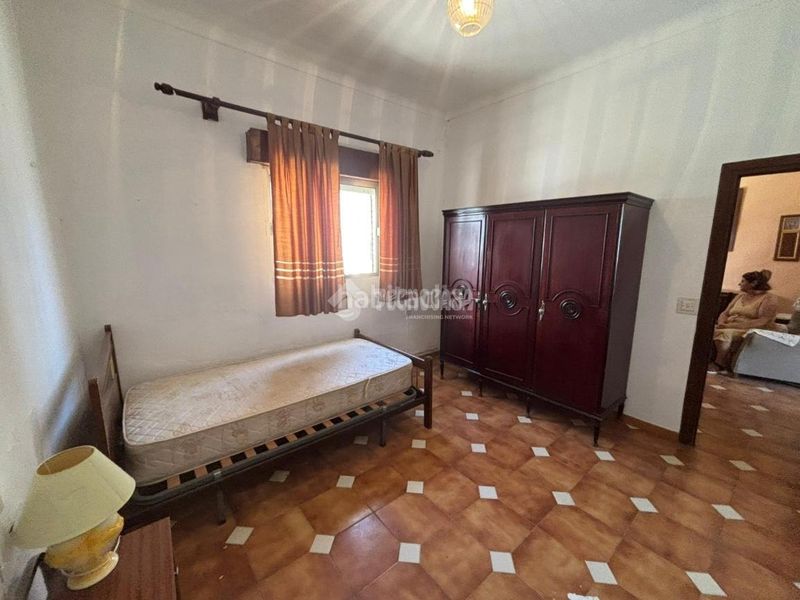 Foto cf54dbeb-f15b-45b4-92db-ca86b9c62307. Casa aparellada a Écija