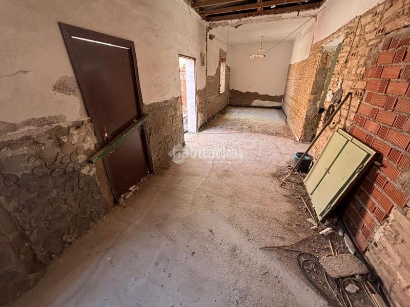 Foto da338eb8-a733-49ea-806f-ad0558d3f50e. Casa aparellada a Écija