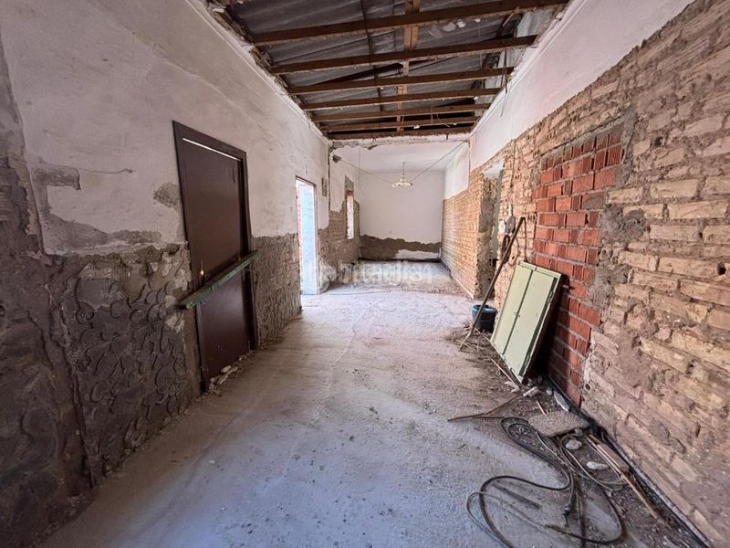 Foto e368d83d-a871-4397-839a-3c1fd2d50544. Casa aparellada a Écija