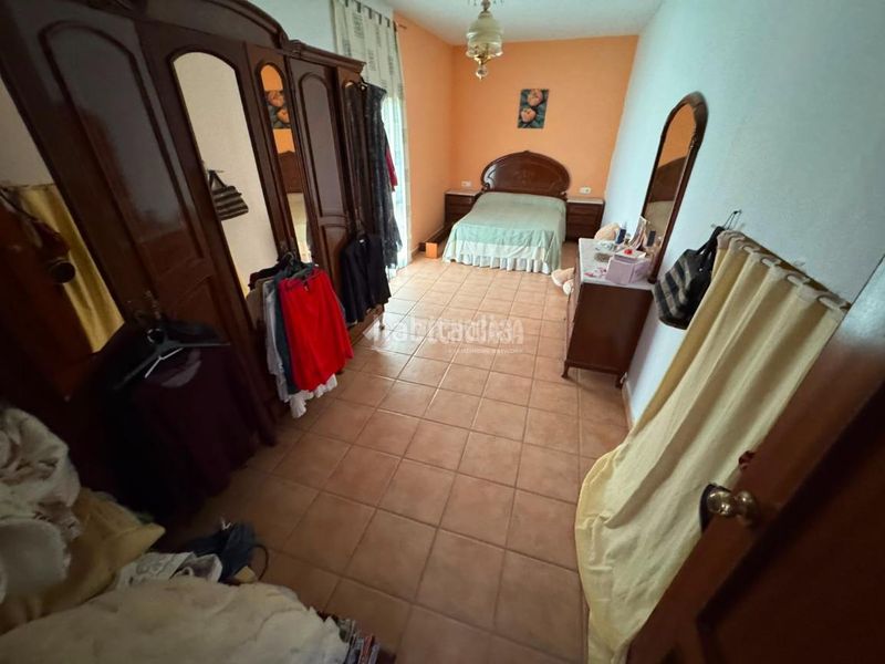 Foto 396165ca-3b25-442c-b619-53868d6d6ee6. Casa aparellada a Écija