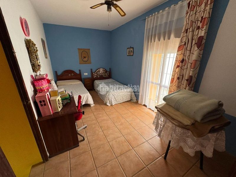 Foto d49e8d2d-21ef-49ec-a06b-7b0364ee93fb. Casa aparellada a Écija