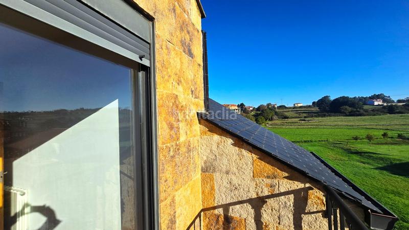 Foto 2acee53b-b806-42f1-af55-d06e8853bff6. Casa adossada amb calefacció aparcament a Cudón Miengo