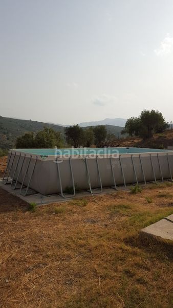 Foto 2f9d9654-6049-4453-9a23-03060238a71d. Masia amb calefacció aparcament piscina a Alozaina