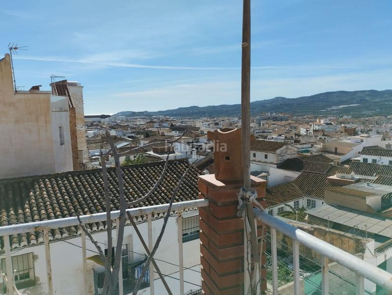 Foto a1a0c15f-7717-46f9-8993-37329e5fe706. Casa adosada en Centro Histórico Vélez - Málaga