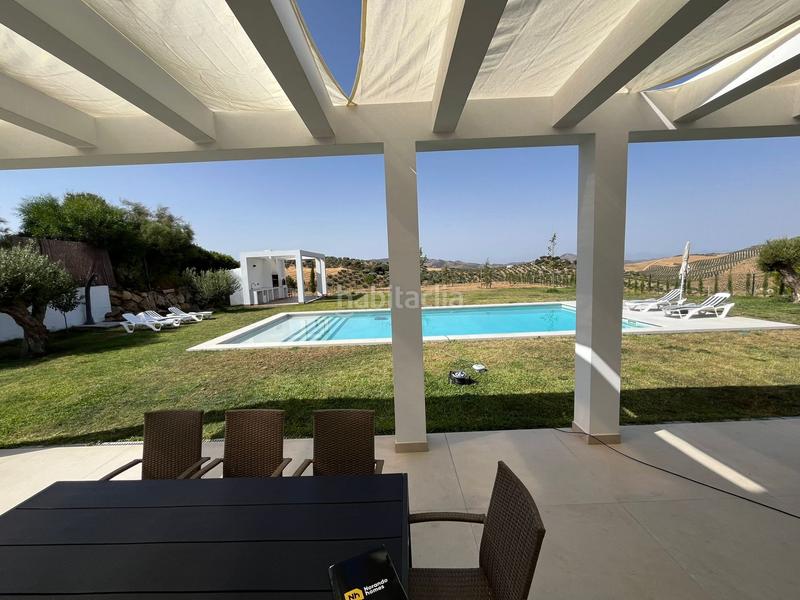 Foto b0c31207-3ea8-4e23-8203-adb4cb25a283. Xalet amb piscina a Colmenar