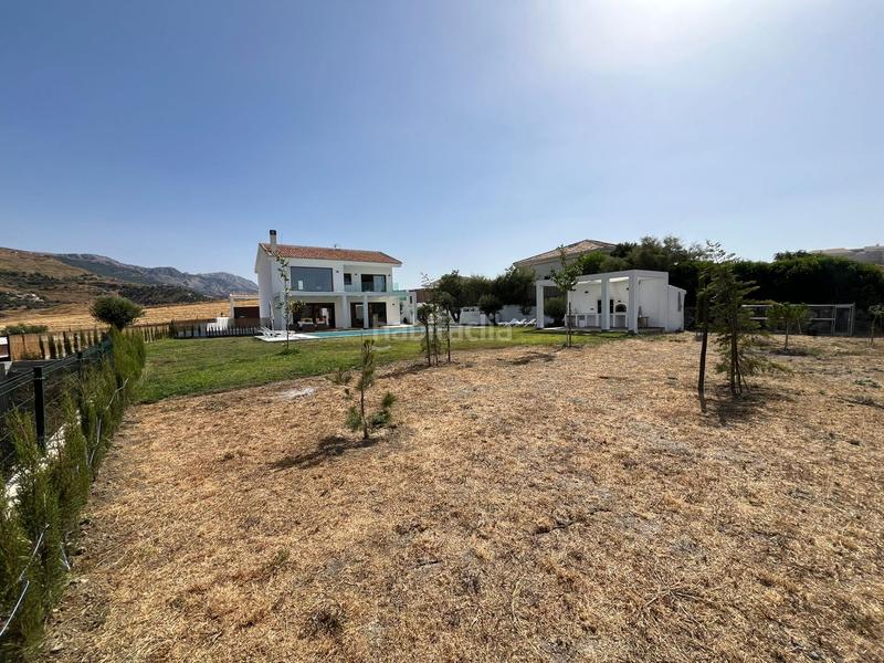 Foto c1ce89ad-b850-469a-ae26-88803da97829. Xalet amb piscina a Colmenar