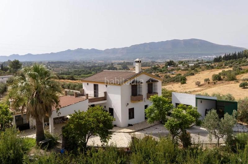 Foto 6a8b9963-d55e-46d2-81b7-95cdf56e77f3. Rural plot in Cártama