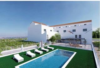 Casa adossada a Rafal. Adosado de 4 dormitorios con solárium privado y piscina comunita