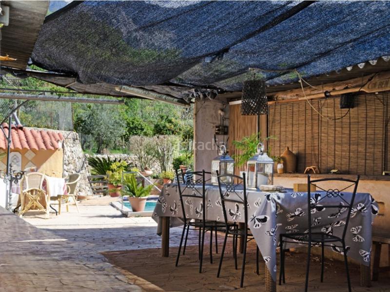 Foto 59b09f5f-7f41-4e28-9750-df6bd2e29f2a. Masia amb aparcament piscina a Sóller