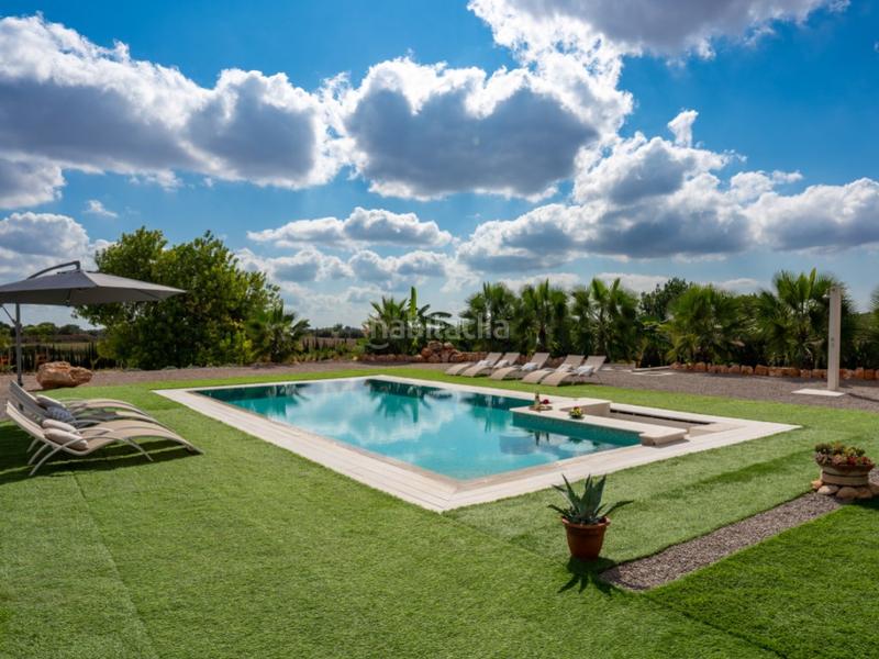 Foto c33994bc-ad7e-4fd6-b1db-8ab391031a56. Masía moderna casa de campo de nueva construcción con piscina en Llucmajor