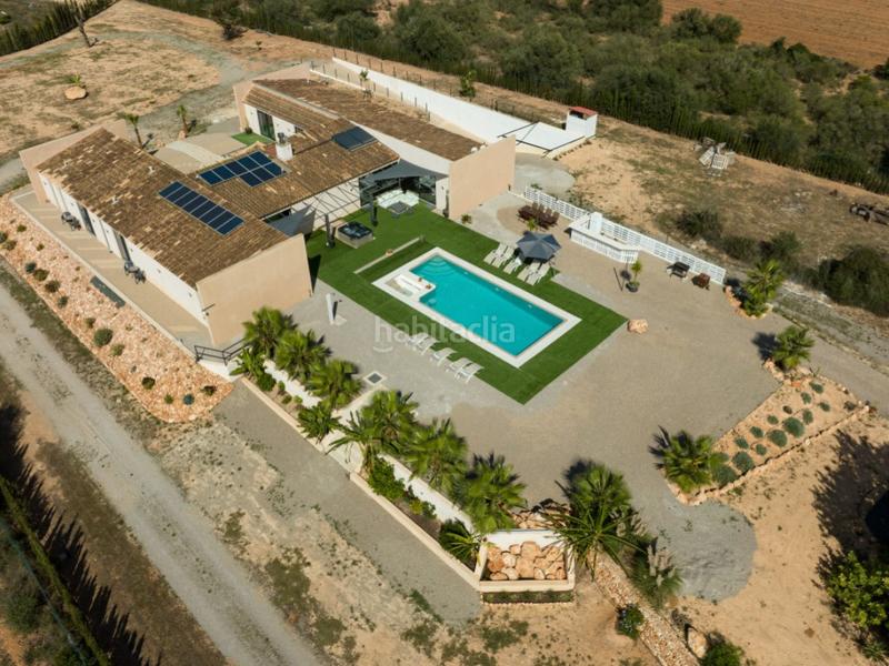 Foto f0c1dd5b-bb06-438e-a9e2-8e42126c422f. Masía moderna casa de campo de nueva construcción con piscina en Llucmajor
