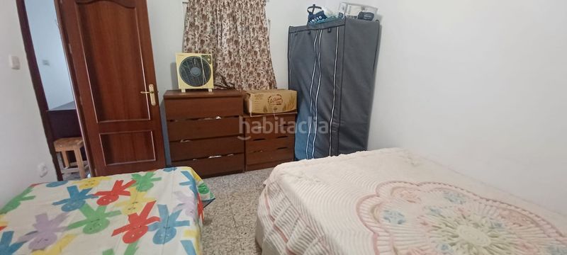 Foto f2611422-7a30-4869-a20f-4b4d0c905e07. Casa adossada a Castilblanco de los Arroyos