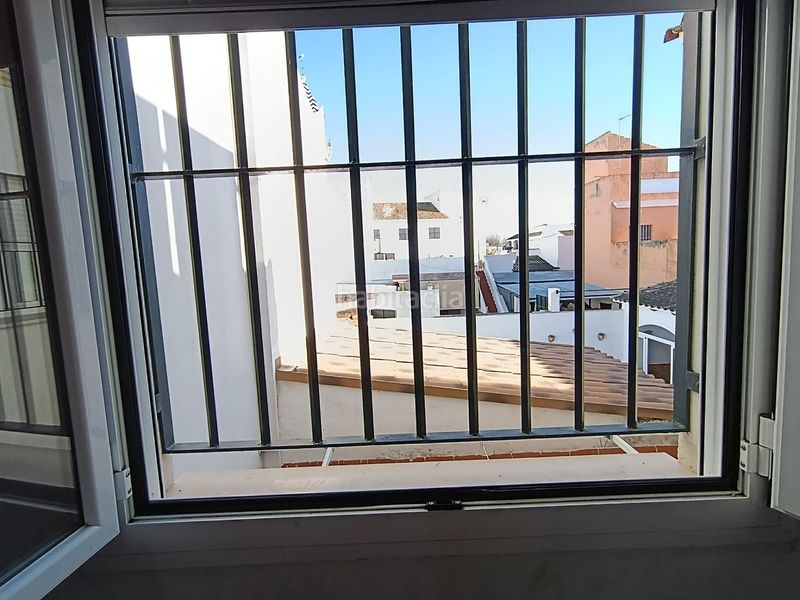 Foto 2812cb0a-a8aa-4e70-a62f-d6d38671f4fe. Casa adossada a Alcalá del Río