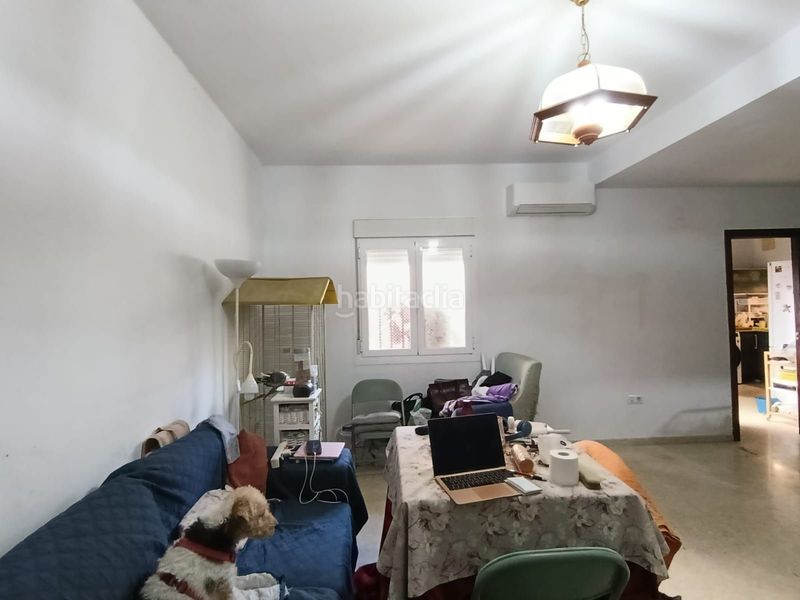 Foto e231e400-319d-4228-9672-525fa370e3cc. Casa adossada a Alcalá del Río