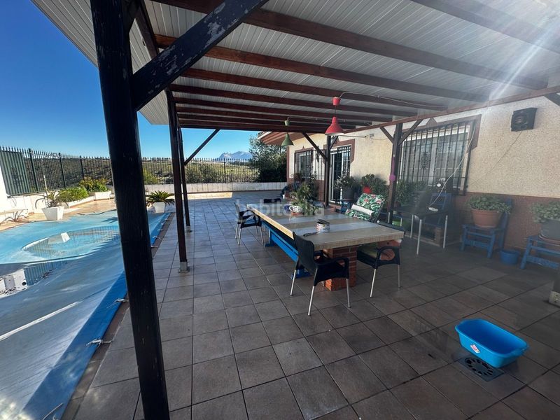 Foto 4c7bd8ca-12c0-44e8-a3fa-d61cd1f053fc. Casa con piscina in Atarfe