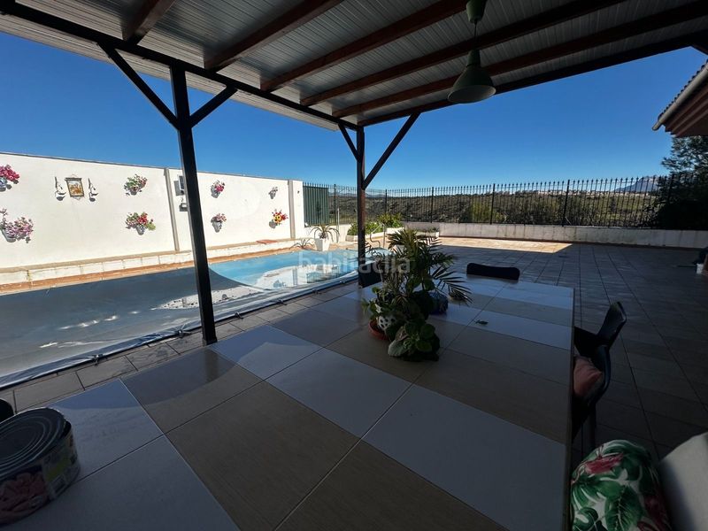 Foto 9319630f-919a-4da4-8534-cc4b28272e68. Casa con piscina in Atarfe