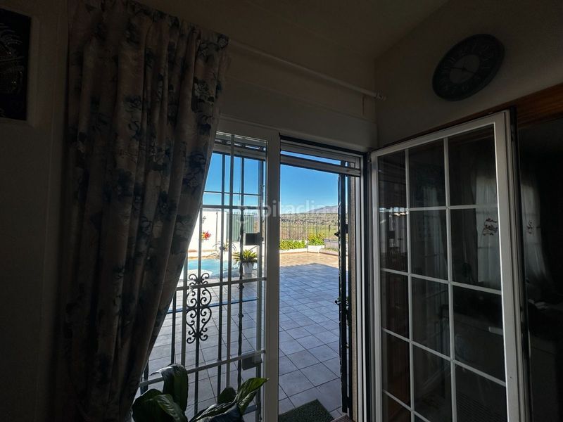 Foto bcb46e8b-9171-4f0b-be64-a67747699094. Casa con piscina in Atarfe