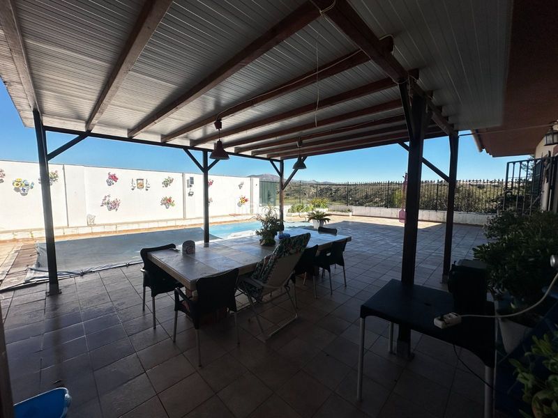 Foto d13395c2-4ce1-4263-bfde-7874f513b910. Casa con piscina in Atarfe