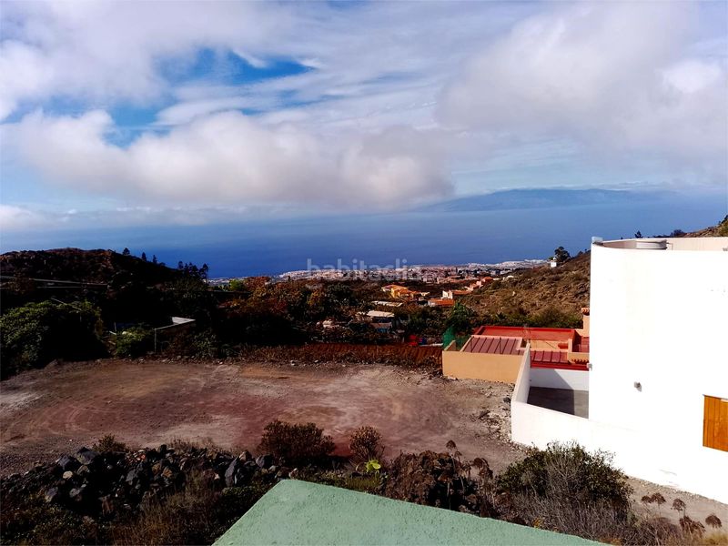 Foto 0fc22d87-b8e8-411f-a329-935b29f3d06a. Casa amb xemeneia aparcament a Guía de Isora interior Guía de Isora