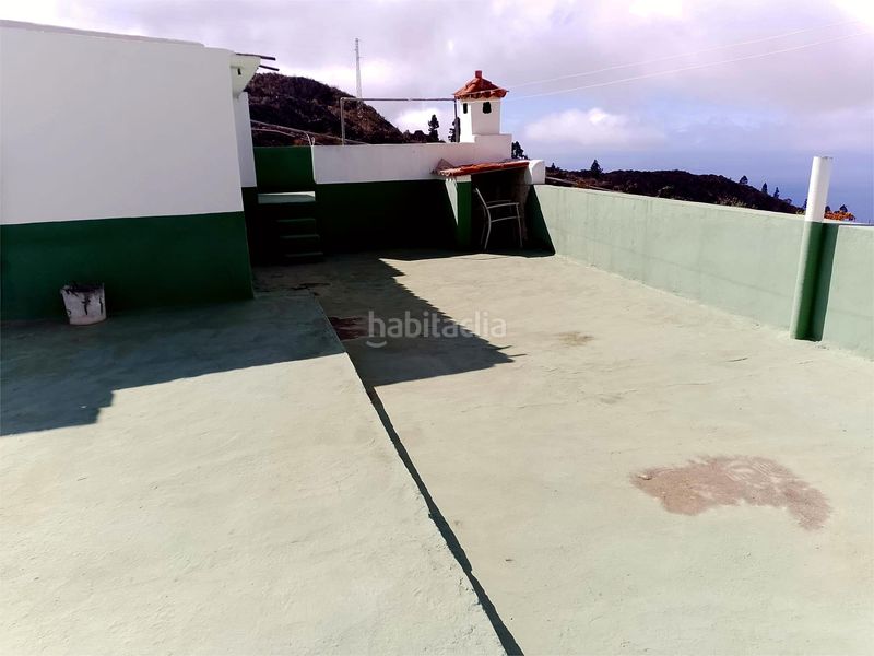 Foto 2ea2a6ca-0bfb-48c6-9a6f-0faa0a55e8c7. Casa amb xemeneia aparcament a Guía de Isora interior Guía de Isora