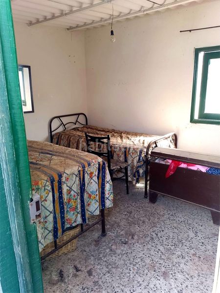 Foto 75cb7900-00bc-47dc-b8a9-c8d68da43957. Casa amb xemeneia aparcament a Guía de Isora interior Guía de Isora