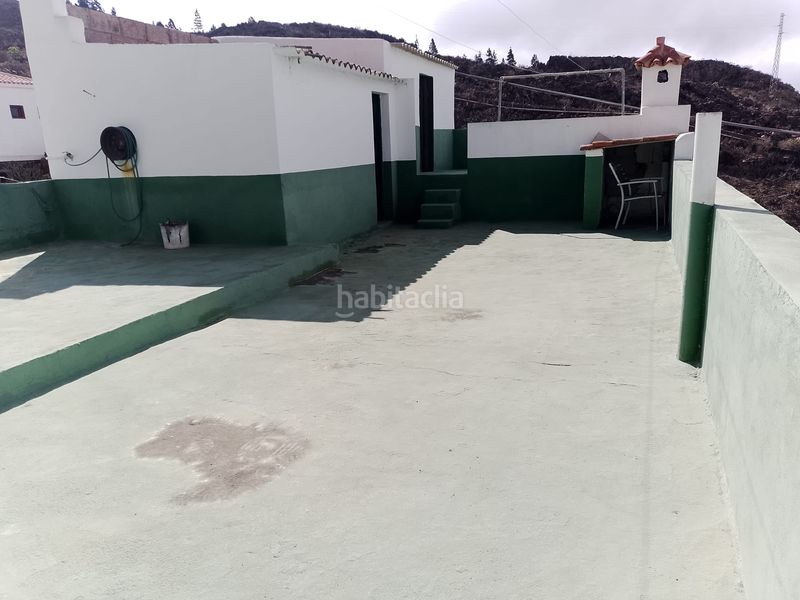 Foto 856ef09f-c51e-41c5-b90b-7c6decf79884. Casa amb xemeneia aparcament a Guía de Isora interior Guía de Isora